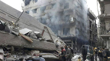 Air strikes and rockets hit Syria enclave despite truce