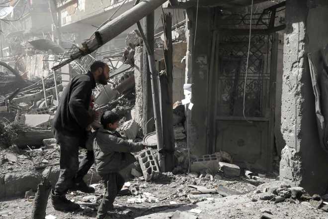 Death toll from market attack in Syrian capital rises to 44