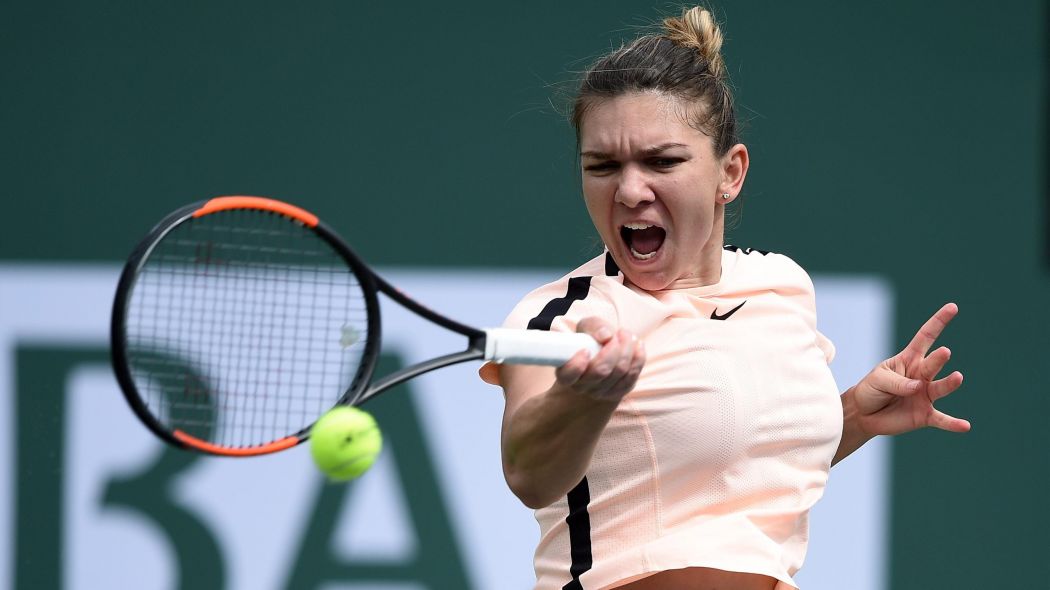 Halep beats Wang to reach BNP Paribas quarters