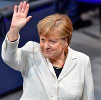 Merkel narrowly elected to fourth term as German chancellor