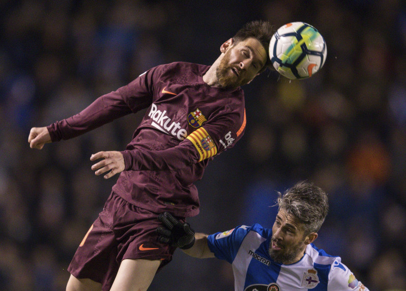 Messi hat-trick helps Barca seal Spanish League title