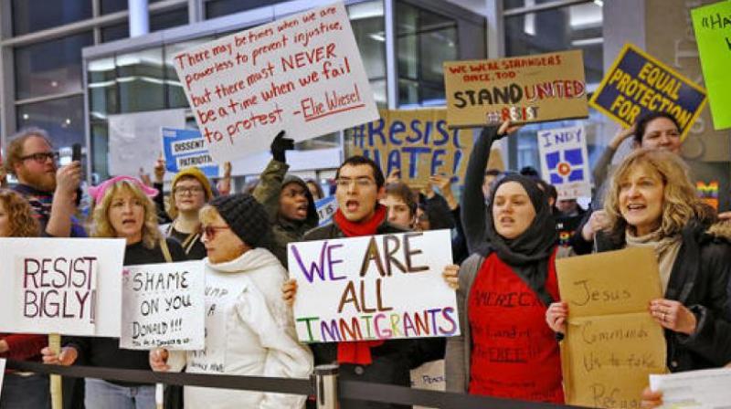 US high court reviews Trump’s power to block Muslim immigrants