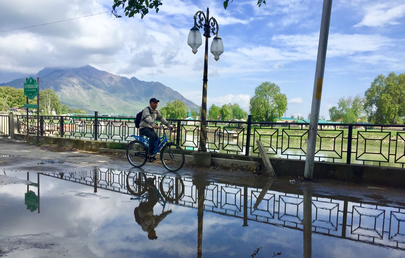 A cyclist is seen peddling on Residency Road side of Jehlum Band on Tuesday…..