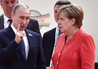 Putin, Merkel reaffirm commitment to Iran nuclear deal: Kremlin