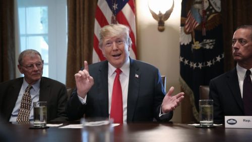 Trump backs down on controversial migrant family separations policy