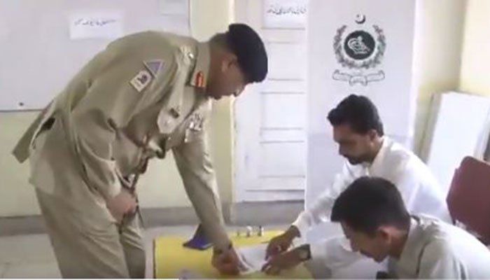 Pak Army chief votes, urges voters to defeat “inimical forces”