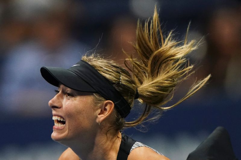 Sharapova lights up US Open again with win over Ostapenko