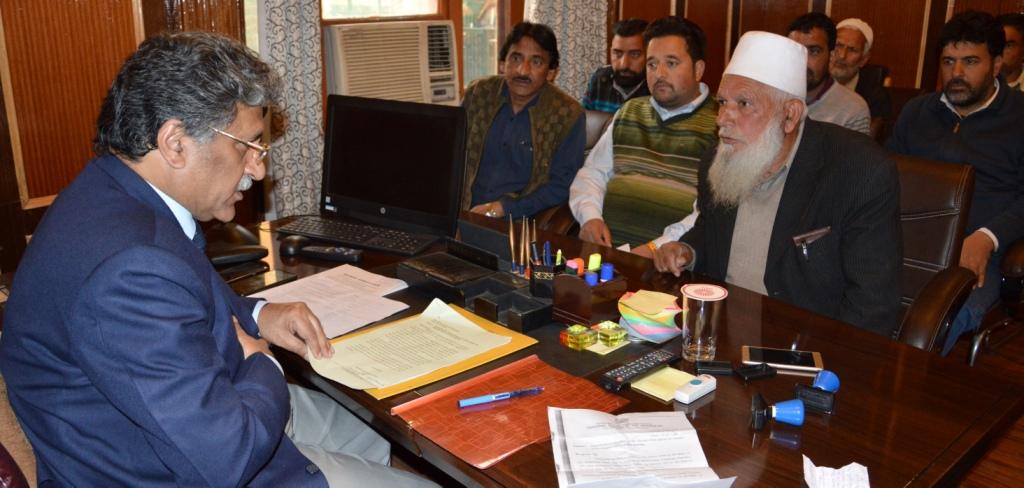 Khurshid Ganai listens to public grievances in Srinagar