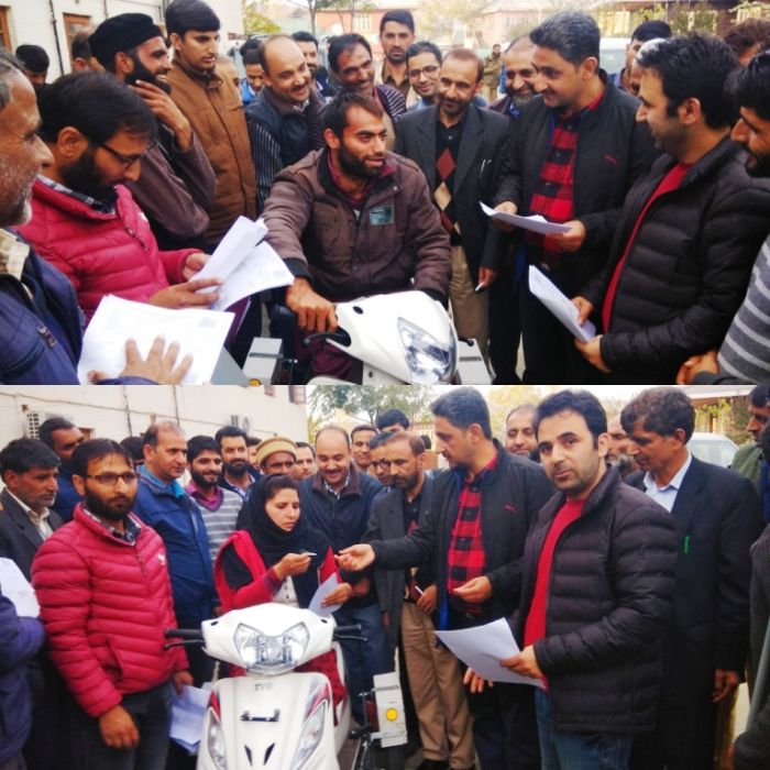 DDC Kupwara distributes motorized tricycles among beneficiaries