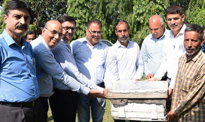 Director Agriculture distributes Bee Colonies among Bee keepers