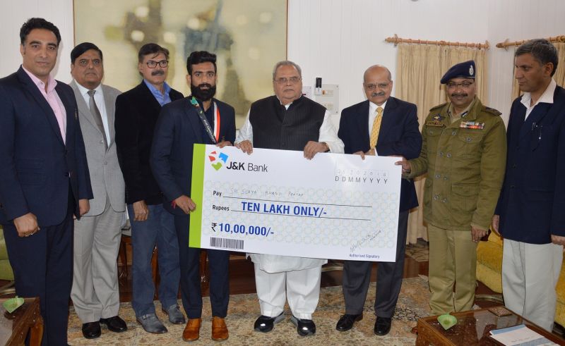 Governor felicitates Bronze Medalist Surya Bhanu Pratap, Coach