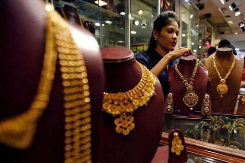 Gold prices up on festive season buying, global cues