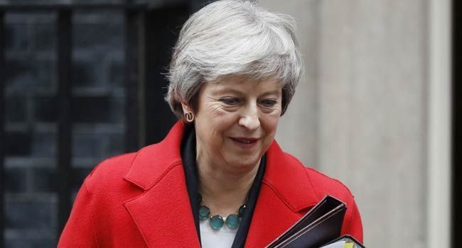 May heads to Brussels as Spain threatens Brexit summit