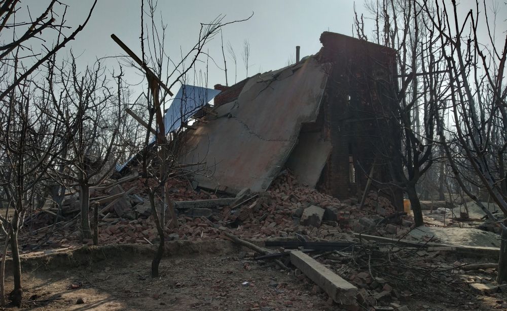 House razed to ground during gunfight, owner appeals for compensation