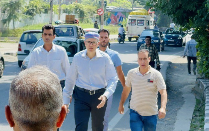 July 13: Omar Abdullah walks to party office after police allegedly denied escort vehicles