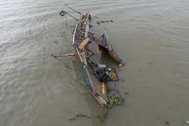 Philippine ferry was overloaded when it flipped over, leaving 27 dead, official says