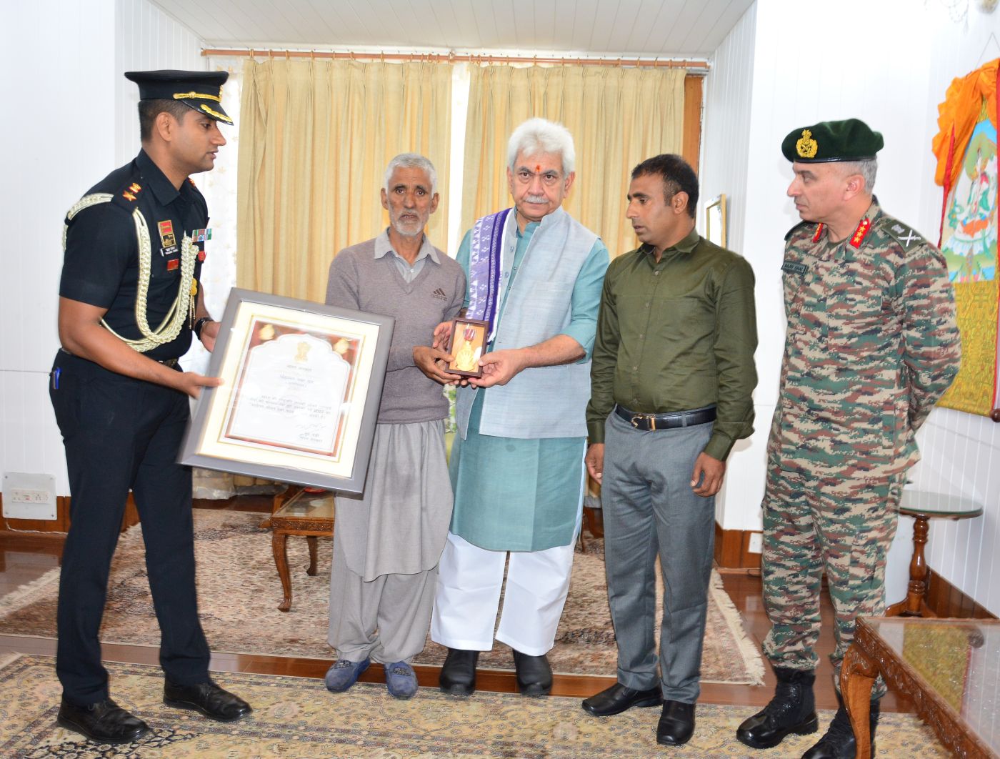 LG hands over ‘Sarvottam Jeevan Raksha Padak’ to martyr’s father