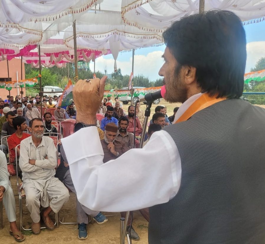 Ghulam Ahmad Mir interacts with party workers in Shopian