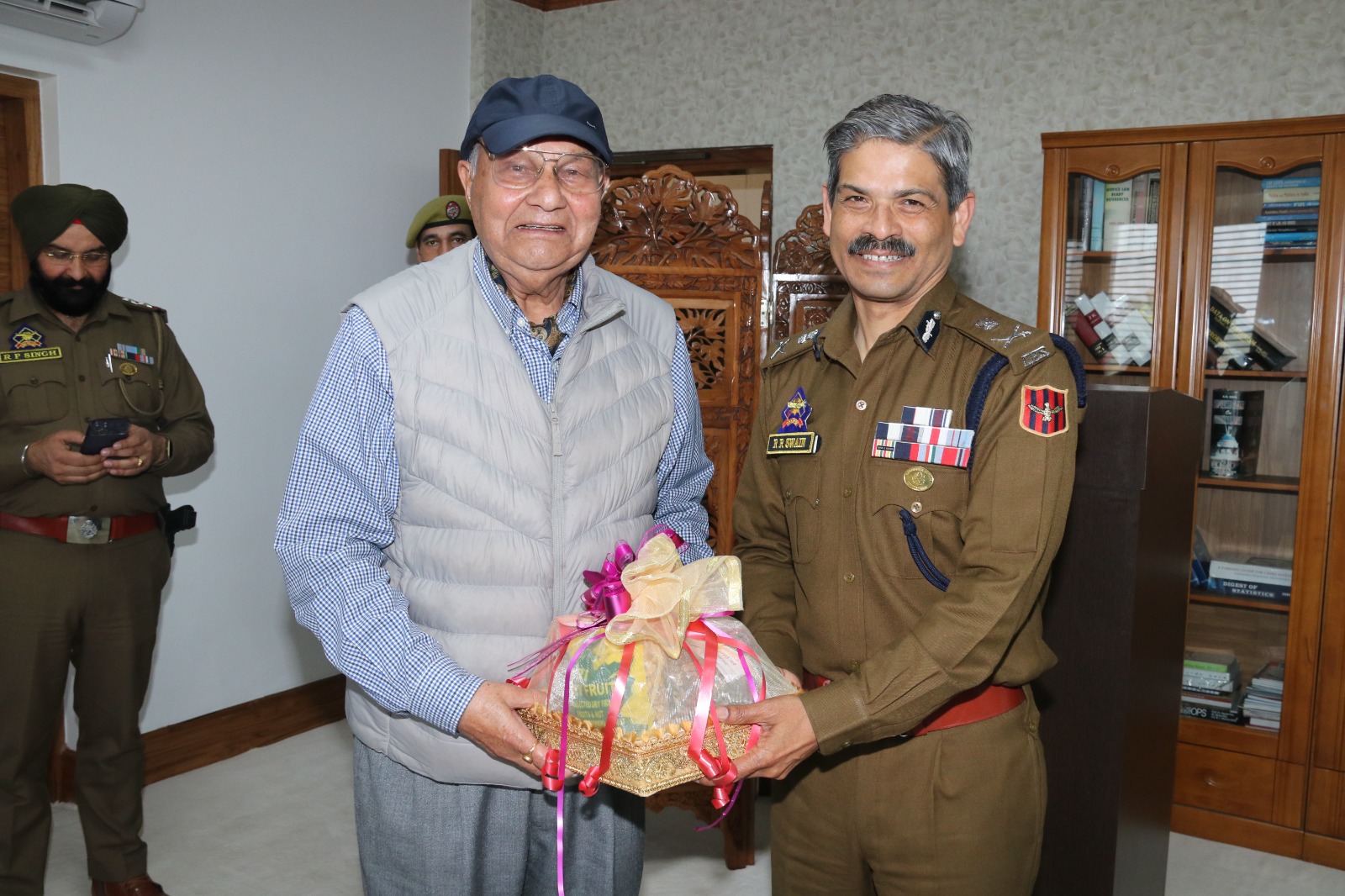 Former DGP M.N. Sabharwal calls on DGP Swain