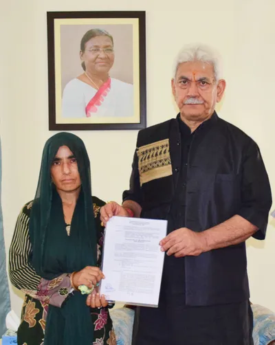 Lt Governor hands over appointment letter to wife of civilian bus driver martyred in Reasi terror attack