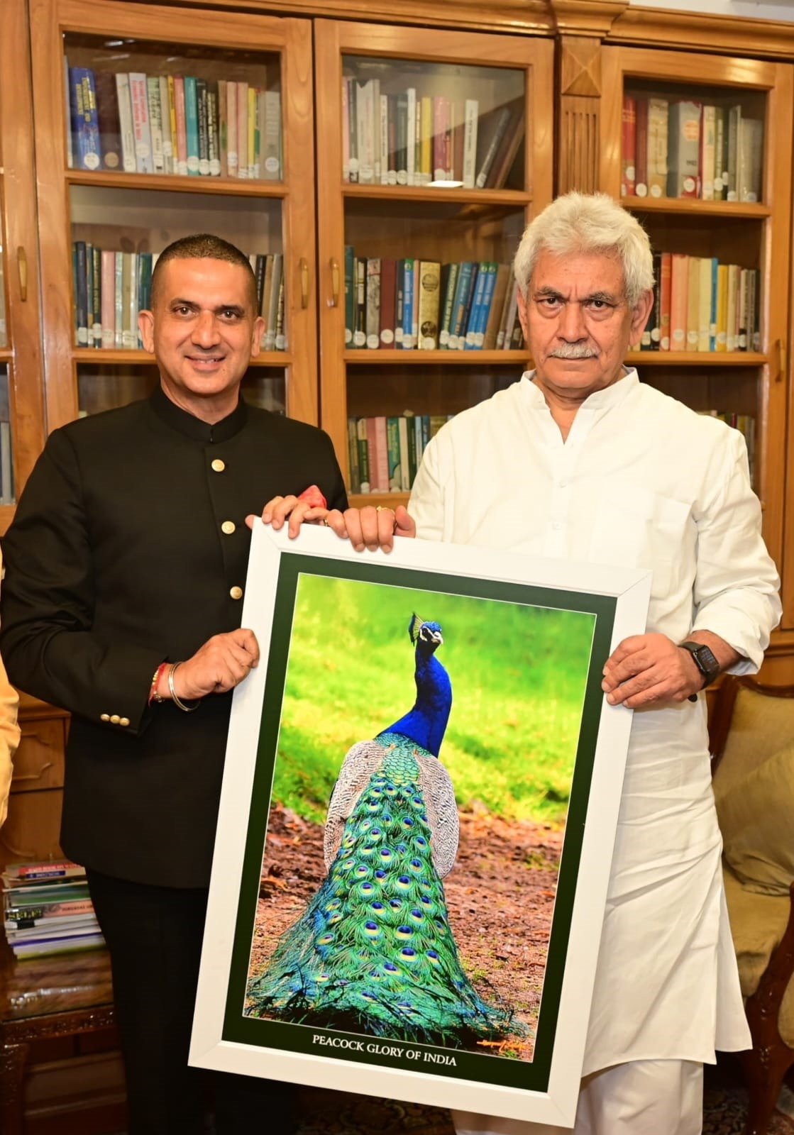 Lieutenant Governor Manoj Sinha was today presented with the Pictorial Art-work “Pride of Peacock is Glory of India”, by Harpreet Sandhu, eminent Author, Environmentalist, Nature Artist and former Additional Advocate General Punjab at Raj Bhawan.