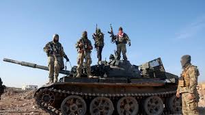 Syrian army says it has withdrawn from Hama after insurgents broke through its defences