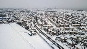 Heavy snow brings widespread disruption across UK, Germany