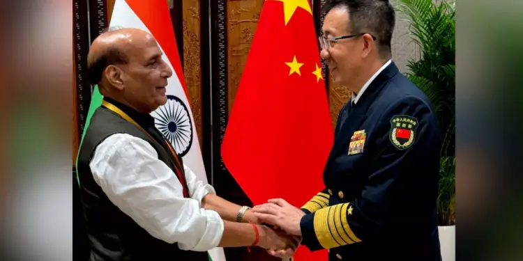Rajnath meets Chinese counterpart; stresses avoiding new complexities in ties
