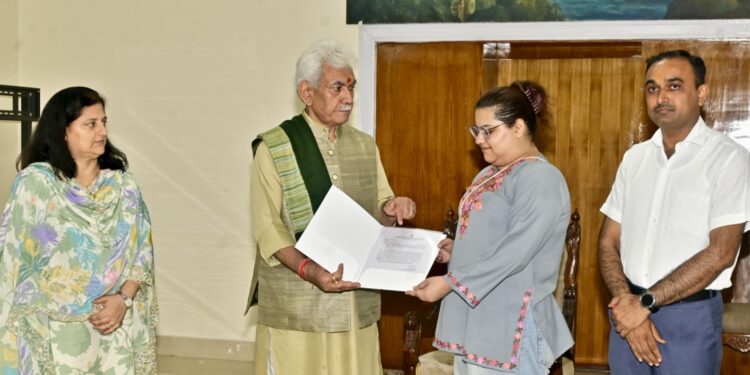 LG hands over job assurance letter to daughter of ADDC Rajouri, Dr. Raj Kumar Thapa