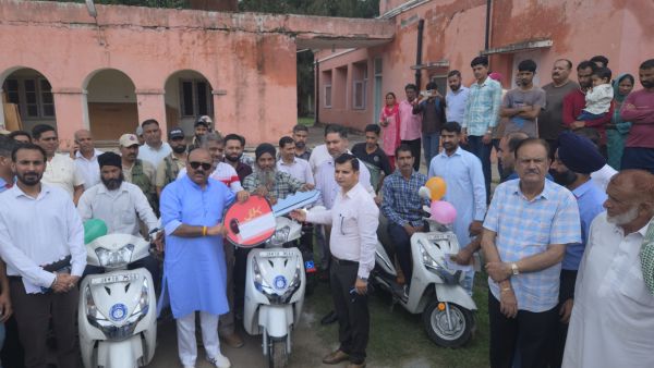 Dy CM distributes appointment letters, motorized tricycles among beneficiaries at Nowshera