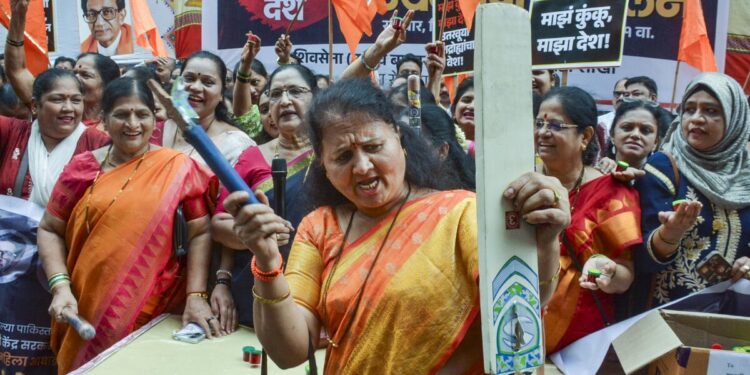 As India, Pakistan take to field in Dubai, opposition parties hit the streets