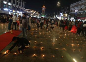 Hindu devotees celebrated Diwali by lighting earthen lamps near Ghanta Ghar, Lal Chowk in Srinagar