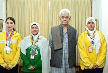 Lt Governor Sinha felicitates DPS Srinagar athletes
