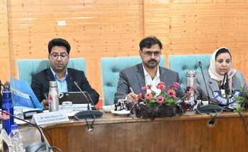 Satish Sharma chairs district review meeting in Kulgam