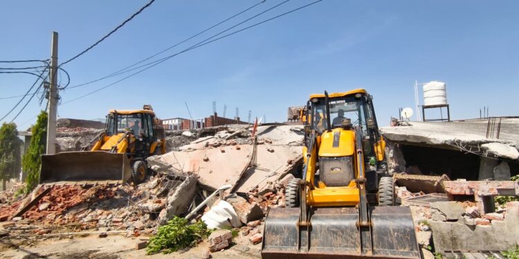 Residences of two drug peddlers demolished in outskirts of Jammu city