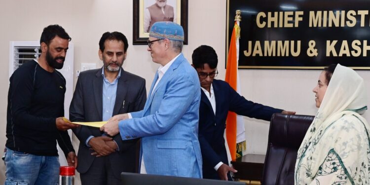 CM Omar Abdullah hands over regularisation orders to CPWs of School Education Department