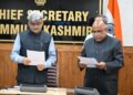 CS administers oath to Suresh Kumar Gupta as JKWRRA Chairperson