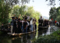 A traditional mourning procession was taken out on Dal waters on the 9th day of Muharram