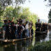 A traditional mourning procession was taken out on Dal waters on the 9th day of Muharram