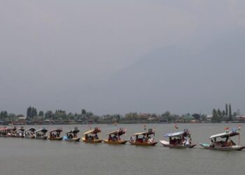 Kashmir Images photographer Farooq Javed captures a scenic view of the Tiranga rally on Dal Lake as the main function was led by LG Manoj Sinha