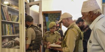 Police search 26 locations in Kashmir linked to banned JeI