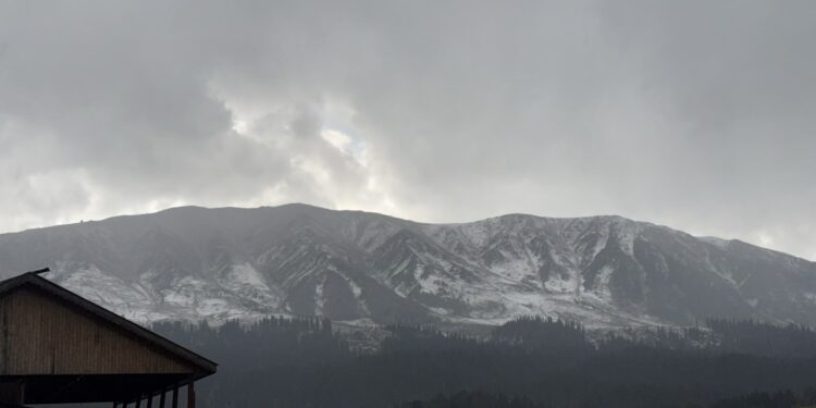 Gulmarg’s Affarvat peak receives fresh snowfall Tuesday afternoon